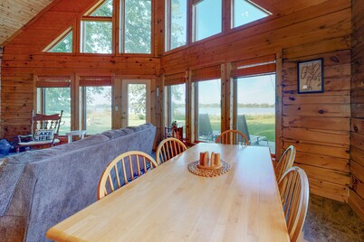 Private island getaway with beach access, lake views, wood stove, and WiFi
