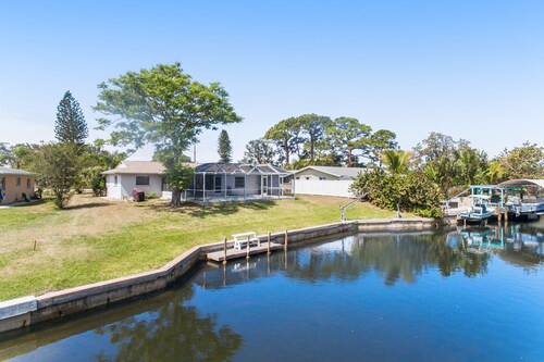 Waterfront & ground-floor home with free WiFi, dock, pool, & central AC