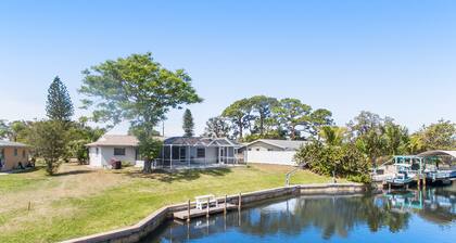 Waterfront & ground-floor home with free WiFi, dock, pool, & central AC