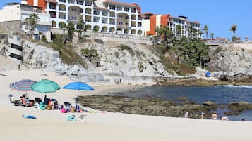 On the beach, sun-loungers, beach towels