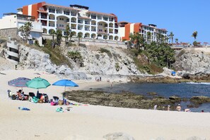On the beach, sun-loungers, beach towels