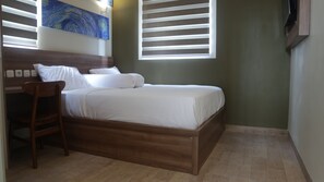 Kamar Deluks | Meja kerja, kedap suara, Wi-Fi gratis, dan seprai linen