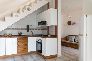 Fridge, oven, electric kettle, cookware/dishes/utensils