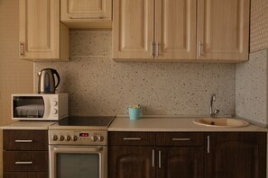 Comfort Condo, 2 Bedrooms | Private kitchen | Fridge, microwave, oven, stovetop