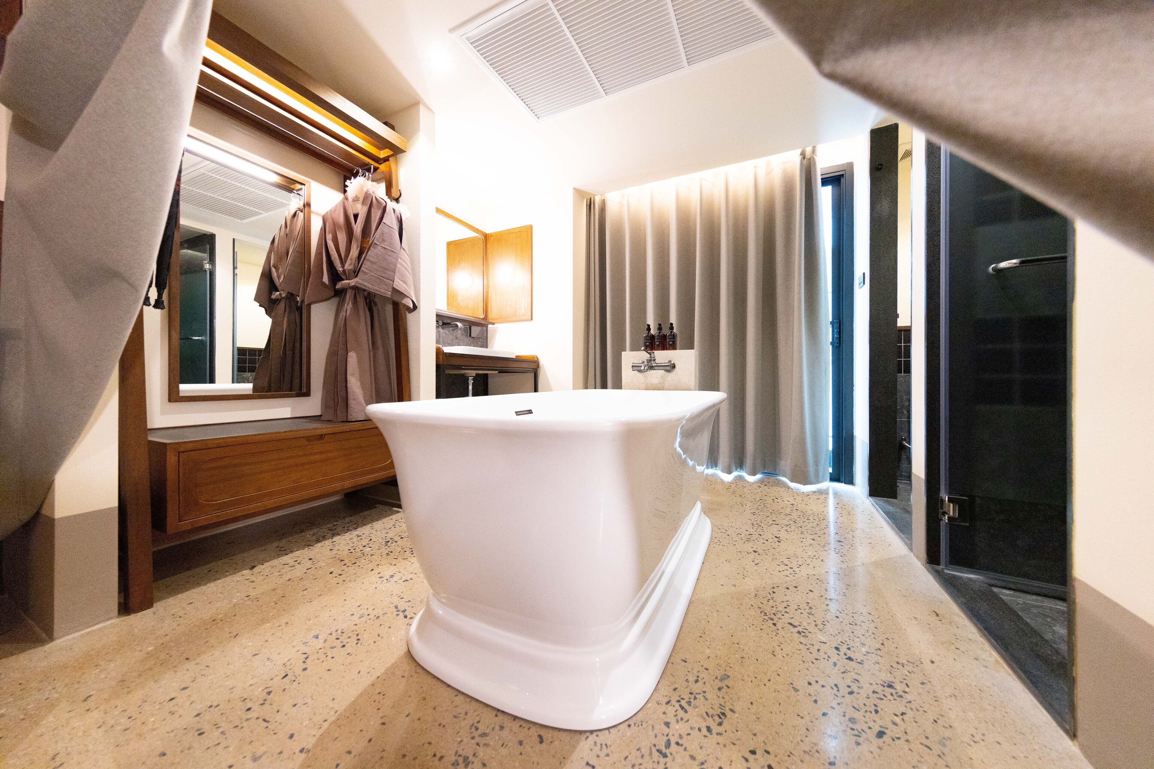 deluxe grand double | bathroom | separate bathtub and shower, hair dryer, bathrobes, slippers