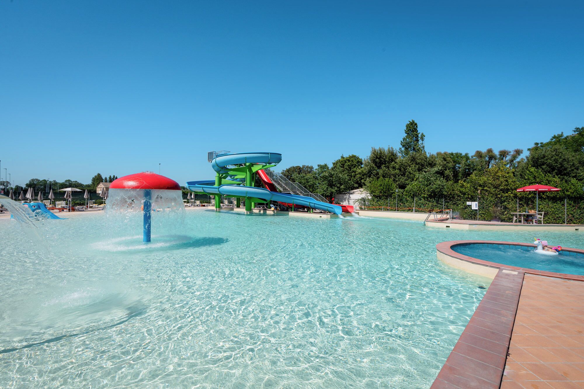 Seasonal outdoor pool, open 9:00 AM to 6:00 PM, pool umbrellas