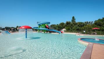 Seasonal outdoor pool, open 9:00 AM to 6:00 PM, pool umbrellas