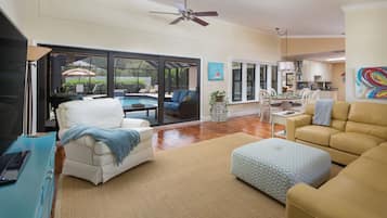 Smart TV, fireplace, books, offices
