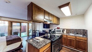 Fridge, stovetop, coffee/tea maker, blender