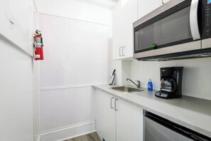 Microwave, stovetop, coffee/tea maker, toaster