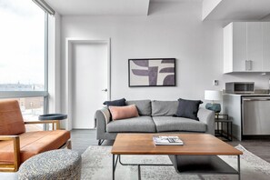 TV, stereo - Luxe Logan Square 2BR w/ Gym, Roof Deck, 1 block to L, by Blueground (ID #CHI371) (Chicago)