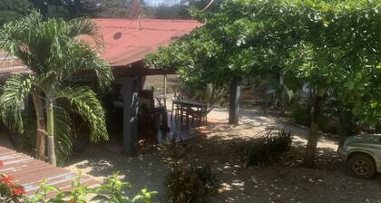 Rustic jungle lodge in a tranquil garden setting - Room 5 Family room