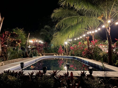 Rustic jungle lodge in a tranquil garden setting - Room 5 Family room