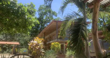 Rustic jungle lodge in a tranquil garden setting - Room 6 Family room
