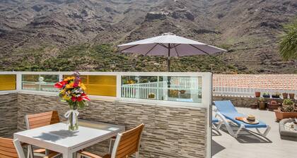 Appartement 'Casa Paco' avec vue sur la montagne, Wi-Fi rapide, climatisation et terrasse
