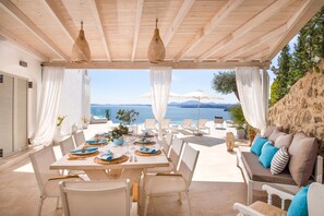 Outdoor dining - 'Prestige Collection'  |  Contemporary Villa with sea views (Pirgi)