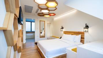 Deluxe King Room | Ropa de cama de alta calidad, edredón y camas con efecto memoria