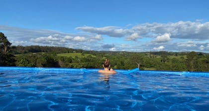 Bed and Breakfast with stunning rural views overlooking pool. Handy to town.