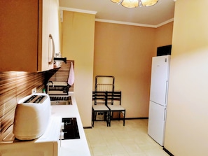 Fridge, microwave, electric kettle, toaster