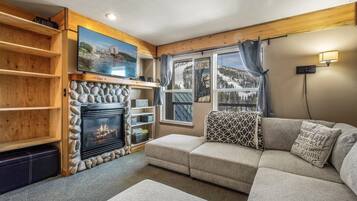 Flat-screen TV, fireplace