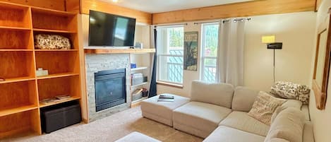 Flat-screen TV, fireplace
