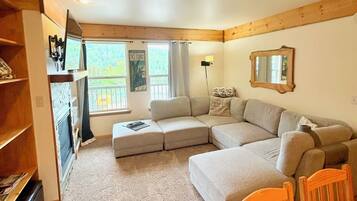 Flat-screen TV, fireplace