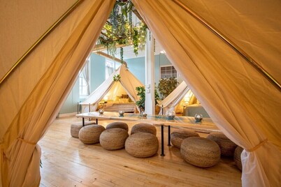 Experience Stay at the Glamping Loft Lake Geneva |Group Stays |Stylish Tent Suites |Kitchen & Bar