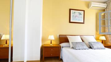 2 dormitorios, tabla de planchar con plancha, wifi gratis y ropa de cama