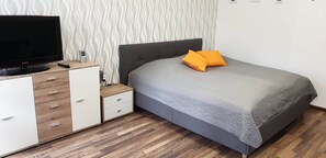 1 bedroom, desk, iron/ironing board, travel cot