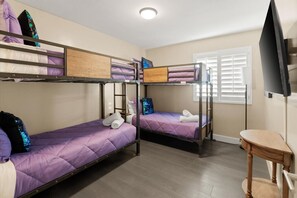 Spacious group room featuring two sets of twin-over-twin bunks to fit the whole crew. - Home Theater | Private Pool | Hot Tub | Mini Golf (Scottsdale)