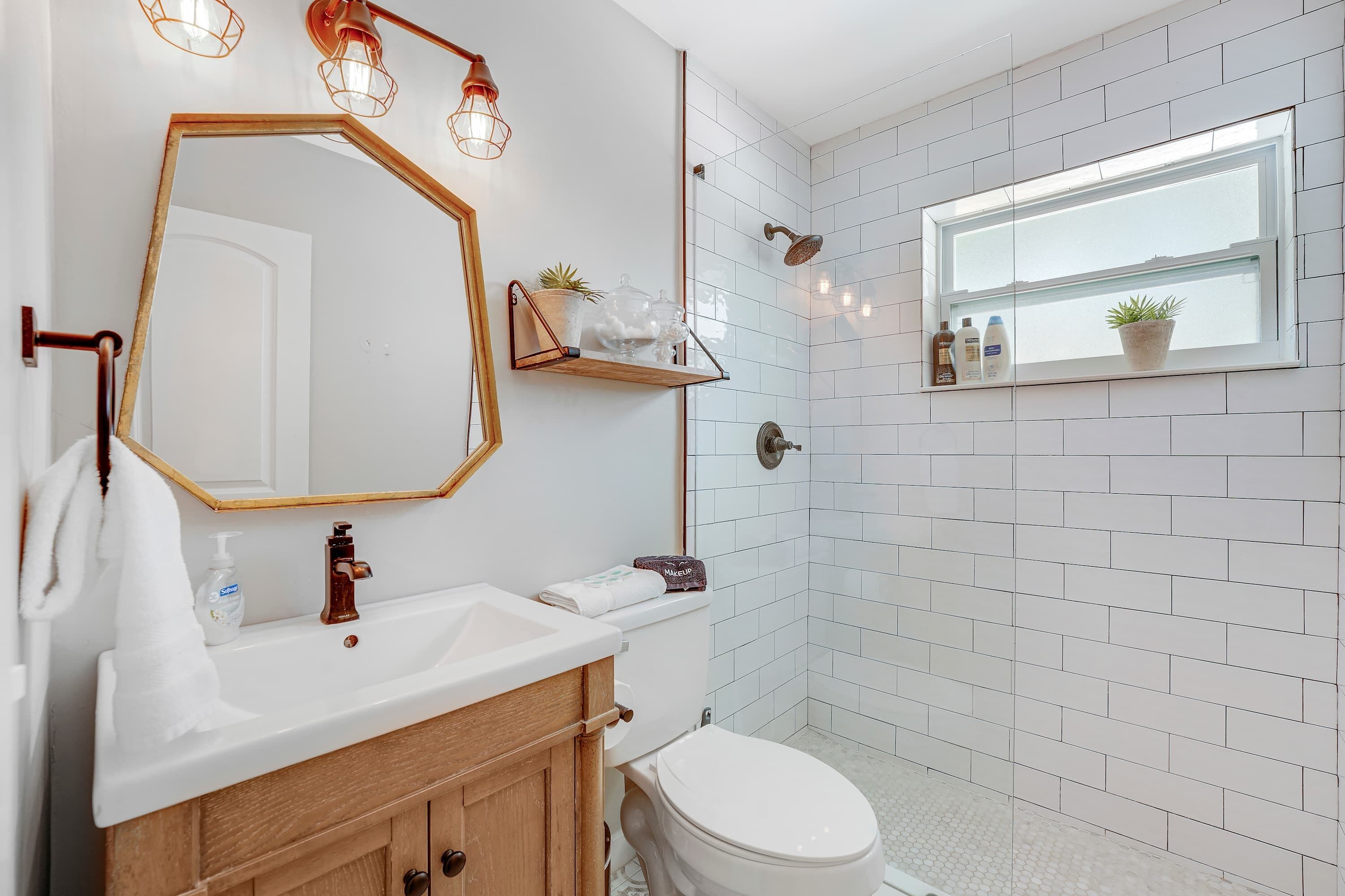 Shower, hair dryer, towels, shampoo