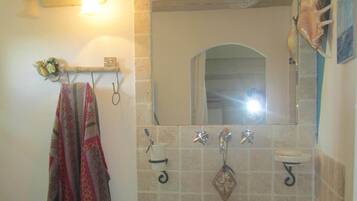 Shower, towels, toilet paper