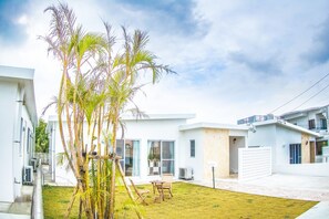 Relax in a contemporary space with an outdoor seating area and beautiful views.
