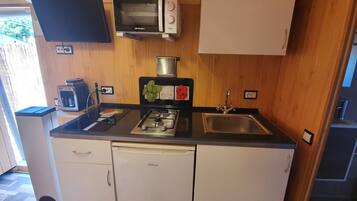 Fridge, microwave, coffee/tea maker, toaster