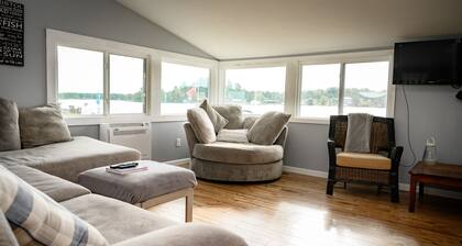 Lake front property with a relaxing front deck overlooking Bristol Lake