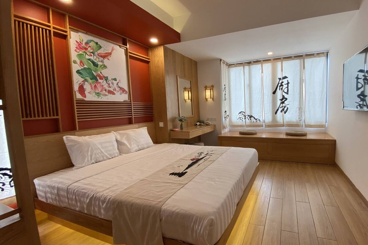 Deluxe kamer, 1 twee- of 2 eenpersoonsbedden | Woonruimte
