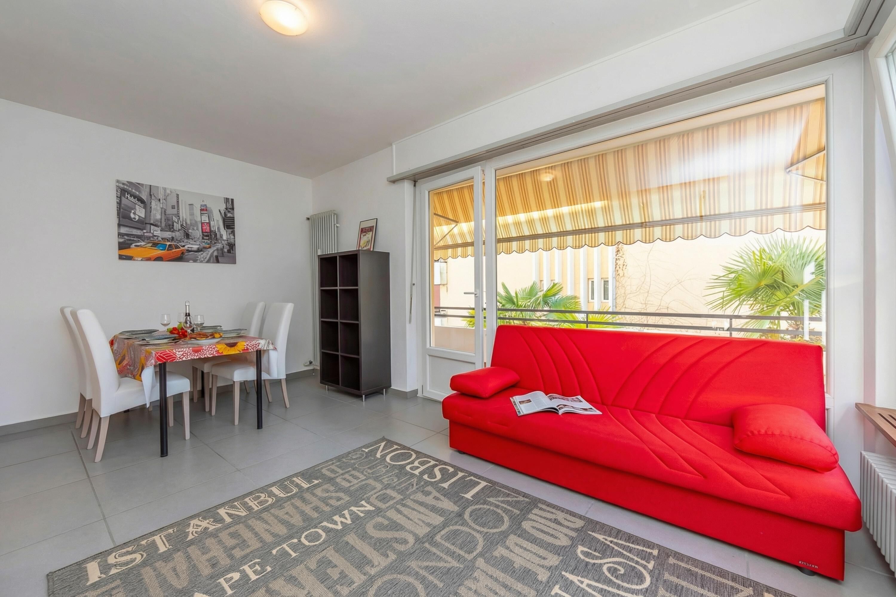Family Apartment, 2 Bedrooms, Balcony (City Apartment with Balcony and) | Living area | Flat-screen TV