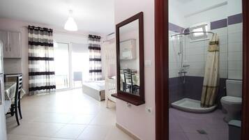 Shower, free toiletries, hair dryer, towels