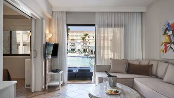 Premium One Bedroom Suite Swim up | Living area | LCD TV