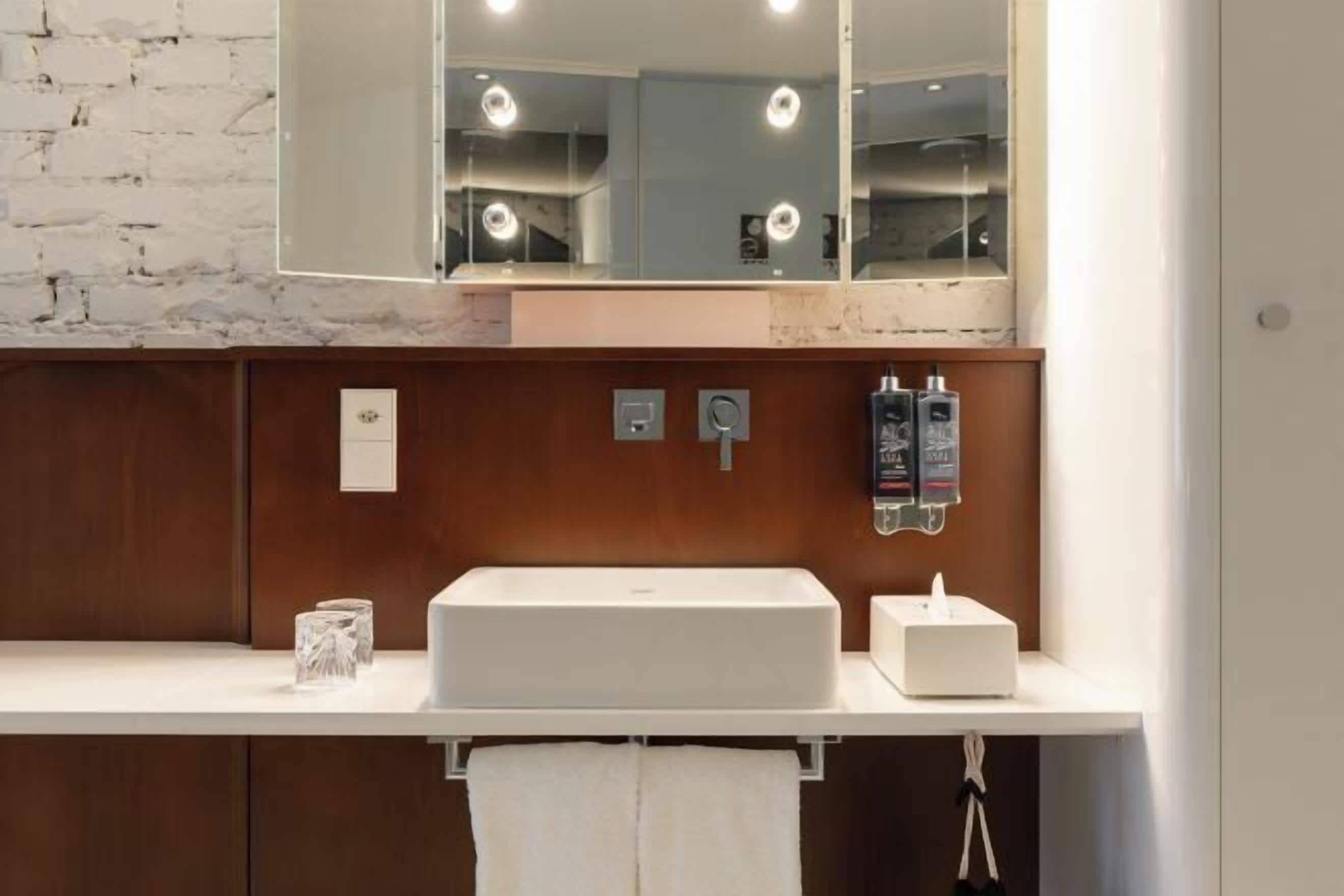 Shower, rainfall showerhead, designer toiletries, hair dryer