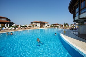 Seasonal outdoor pool, pool umbrellas, sun loungers