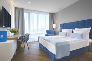 Highlight room with Sea view | Desk, laptop workspace, blackout drapes, iron/ironing board