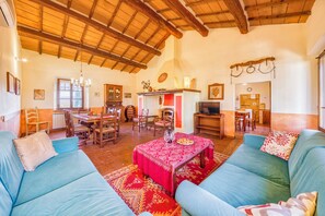 Family Apartment, Multiple Bedrooms, 2 Bathrooms (Sunflower apt with shared pool family) | Living area | Fireplace - Rosehip apt with shared pool (Castiglione del Lago)