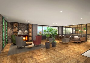 Een moderne lounge met een open haard, zitplaatsen en grote ramen.
