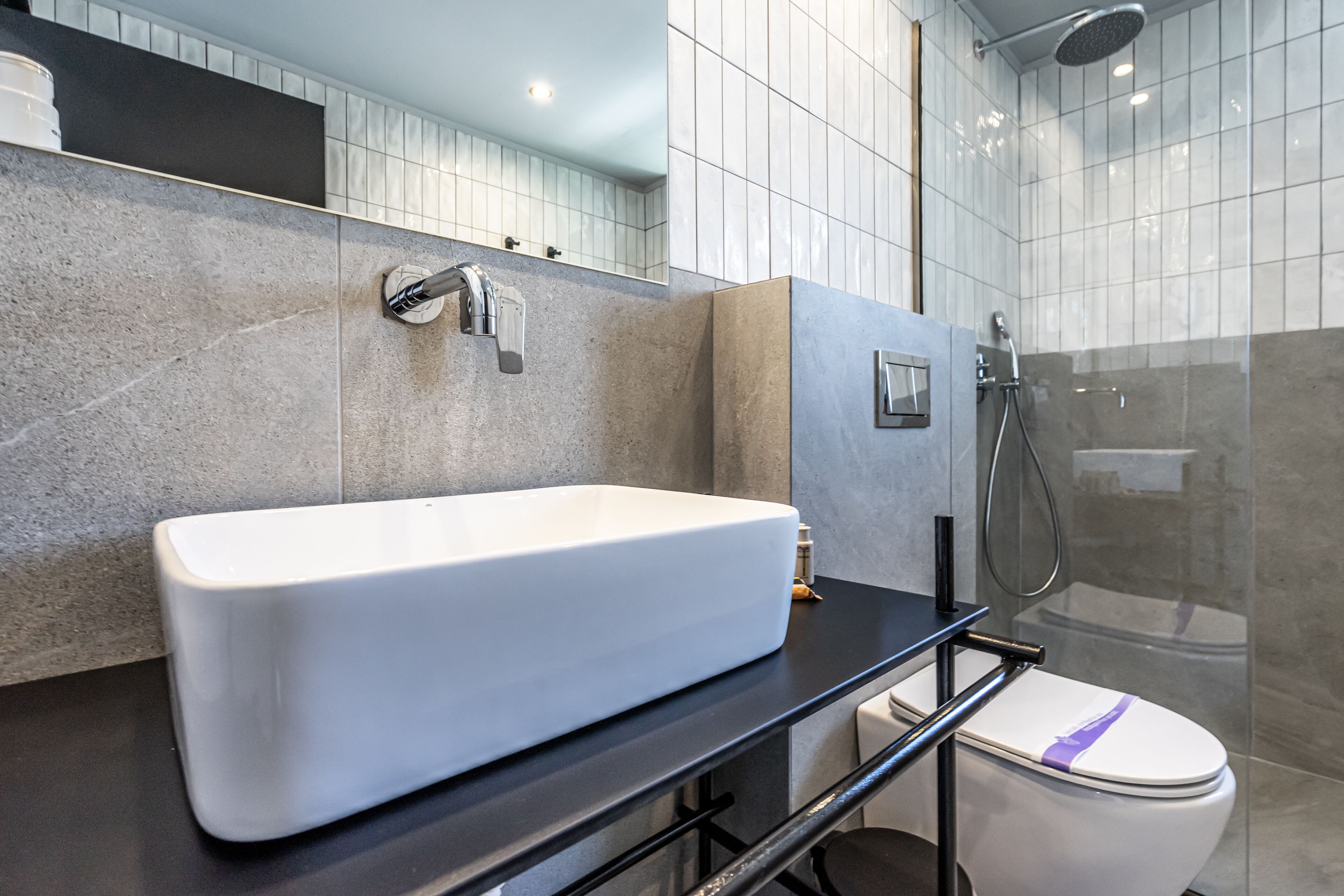 shower, rainfall showerhead, hair dryer, towels