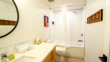 Shower, towels, toilet paper