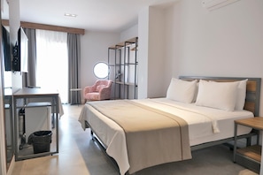 Habitación cuádruple Deluxe | Wifi gratis y ropa de cama 