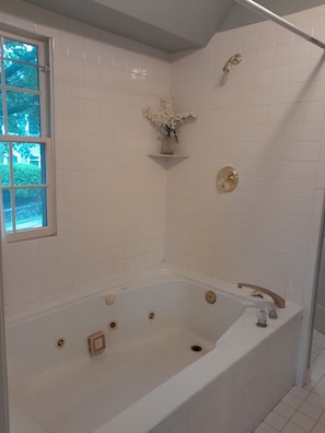 Combined shower/tub, jetted tub