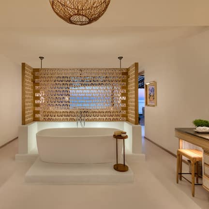 Suite, 1 Bedroom, Sea View | Bathroom | Rainfall showerhead, free toiletries, hair dryer, bathrobes