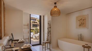 Suite, 2 Bedrooms (Xarraca) | Bathroom | Rainfall showerhead, free toiletries, hair dryer, bathrobes